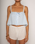 Cropped tank top
Fixed straps
Drawstring neckline
Front button down closures
Crochet trim
Blue crop top
Coquette tank top
Summer tank top