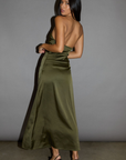 Satin maxi dress. Strapless elastic neckline with inner rubber grip lining. Front wire detail. Side hook and eye and zipper closures. Unlined. olive maxi dress. holiday look. holiday outfit. holiday dress. christmas outfit. christmas dress. new years dress.