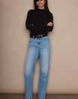 Super high rise straight leg jeans button and zipper fly. Five pocket construction. medium wash denim jeans. light wash denim jeans
