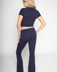 blue lounge set
fall lounge set
TOP
Button down short sleeve top
Round neck
Button down closure
Jersey knit
Unlined
Length: 17.5"
Polyester/Spandex
BOTTOM
Flare pant
Fold over waist
Low rise
Jersey knit
Unlined
Waist: 28" Length: 39.5" Rise: 9"
Polyester/Spandex