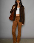 Faux suede pants. Lace up front closure. Faux front pockets. Back pockets. Unlined. stagecoach pants. stagecoach outfit. country concert outfit.
