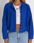 blue Fuzzy knit cardigan
Crewneck
Front button down closures
Long sleeves
Unlined
dodger blue sweater