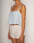 Cropped tank top
Fixed straps
Drawstring neckline
Front button down closures
Crochet trim
Blue crop top
Coquette tank top
Summer tank top