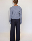 Grey woven trouser pants. Button and zipper fly. Side pockets. Faux back pocket. Unlined. Grey work slack