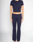 blue lounge set
fall lounge set
TOP
Button down short sleeve top
Round neck
Button down closure
Jersey knit
Unlined
Length: 17.5"
Polyester/Spandex
BOTTOM
Flare pant
Fold over waist
Low rise
Jersey knit
Unlined
Waist: 28" Length: 39.5" Rise: 9"
Polyester/Spandex
