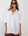 white Woven oversized button down shirt
Collar neckline
Long sleeves with button closures
Front button down closure
Unlined
Cotton/Nylon/Spandex