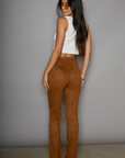 Faux suede pants. Lace up front closure. Faux front pockets. Back pockets. Unlined. stagecoach pants. stagecoach outfit. country concert outfit.