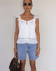 white Eyelet woven top
Button down closure
Lace detailing
Flare hem
Partially lined
summer top