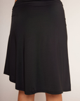 Asymmetrical waist mini skirt
Asymmetrical V cut waist
High-low
Lined
black midi skirt