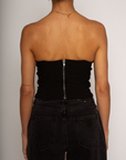 Color blocked woven bustier. Strapless neckline with inner rubber grip lining. Boning in bodice. Back hook and eye and zipper closures. Fully lined. black corset. going out top
