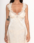 cream Satin slip mini dress with lace detailing
Crafted in a chic floral jacquard
Adorned with lace trims
Ruched underwire cups
Low drawstring back
Skinny chiffon tie bows and rosettes throughout
Unlined
Adjustable shoulder straps
Hook and eye closure at center-back
Polyester/Elastane
lingerie slip dress