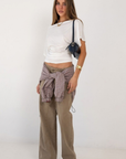 white Draped short sleeve top
Unlined
Length: 24"
Lyocell/Spandex