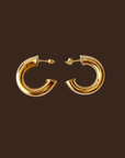 18k Gold filled 25mm chubby C-hoop earrings.
Metal: 18k gold-filled
Size: 25mm diameter
Thickness: 6.7 mm wide tube
Hypoallergenic
Nickel Free
Water-resistant
gold hoop earrings
