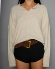 Fuzzy knit cardigan. Crewneck. Front button down closures. Long sleeves. Unlined. tan cardigan. fall cardigan. fall outfit. layering piece