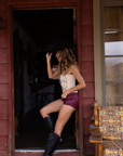 Embroidered knit corset
Adjustable halter tie neck
Front lace up closure
Back hook and eye and zipper closures
Fully lined
Studded details
Coachella outfit
Stagecoach outfit
Festival Outfit