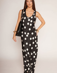 Satin polka dot maxi dress
Scoop neckine
Strapless
Side zipper closure
Unlined
Black and white polka dot maxi dress