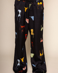 Satin wide leg pants
Bikini graphic printed
Elastic waistband with faux tie
Faux back pocket
Unlined
black bikini graphic pants
beach cover up
swim cover up