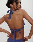 blue denim Halter bikini top
Adjustable neck and back ties Front tie and halter neck tie
Faux denim look
Moderate support bikini top
Polyamide/Cotton/Elastane