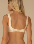 cream Silk bikini top
Square neckline
Cropped Silhouette
Pull-on Style
G-Hook back Closure
Added boning for additional support
80% Recycled Nylon 20% Spandex Fabric