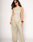 Woven wide leg pants. Elastic waist with drawstring closure. Side pockets. Back pocket. Unlined. resort wear. lounge wear. resort vacation pants. flowy pants. linen pants