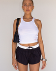 black Flare micro shorts
Adjustable waist tie
Color block waist band
Faux button down
Unlined
summer shorts
cute lounge shorts