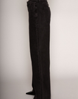 Relaxed fit straight leg jeans. Mid rise. Button and zipper fly. Five pocket construction. Unlined. black denim jeans.