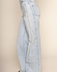 High rise flare leg jean
Button and zipper fly
Five pocket construction
Raw hem
Seamed details
Unlined