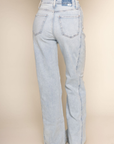 High rise flare leg jean
Button and zipper fly
Five pocket construction
Raw hem
Seamed details
Unlined