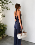 TOP
navy blue Satin tunic top
Adjustable spaghetti strap
Droop back
Unlined
BOTTOM
navy blue Satin pant
Elastic waistband
Unlined
