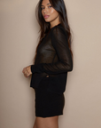Black sheer knit top. Collar neckline. Long sleeves. Front button down closure. Unlined/sheer. going out top. holiday top. fall top. winter top.