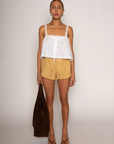 Cropped tank top
Fixed straps
Drawstring neckline
Front button down closures
Crochet trim
White crop top
Coquette tank top
Summer tank top