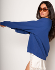 Knit sweater. Crewneck. Banded hems. Fleece lining. tom petty sweater. oversized sweater. blue sweater