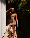 gold Knit metallic mini skirt
Frayed hem fringe
Elastic waistband
Unlined/Sheer
cover up
