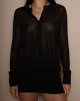 Black sheer knit top. Collar neckline. Long sleeves. Front button down closure. Unlined/sheer. going out top. holiday top. fall top. winter top.