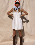 white cotton mini dress with lace straps. festival outfit. country concert dress. stagecoach dress outfit