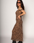 Animal printed chiffon maxi dress. Adjustable straps. Off the shoulder sleeves. Back tie closure. Fully lined. leopard print maxi dress. fall dress. sporing dress. summer dress