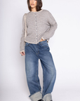 Pin striped knit cardigan
Long sleeve
Rolled collar
Button down closure
Unlined
beige striped cardigan
spring cardigan