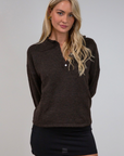 Fuzzy heather crochet knit sweater. Henley quarter neckline with button down closures. Long sleeves. Unlined. brown pullover. brown sweater. fall sweater. fall outfit