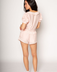 pink Crinkle woven crop top. Eyelet and lace trim. Collar neckline. Short sleeves with elastic openings. Front tie closures. Unlined. pink lounge set. valentines day outfit.