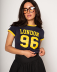 Graphic printed knit crop ringer tee. Crewneck. Short sleeves. Unlined. london graphic tee. baby crop tee