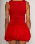 Sleeveless dress. Knit bodice. Woven bubble skirt. Elastic hem. Fully lined. red mini dress. red mini bubble dress. bubble dress. summer dress. night out dress. going out dress. date night dress