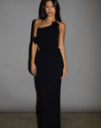 TOP: Black Ribbed knit tank top. Adjustable halter tie neckline. Rosette details. Side slit. Unlined.
BOTTOM: Black Ribbed knit maxi skirt. Elastic waist. Back slit. Unlined.
Black set. holiday outfit. christmas outfit. nice christmas outfit