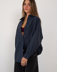 blue Plaid oversized button down shirt
Front button down closure
Collared
Unlined
