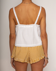 Cropped tank top
Fixed straps
Drawstring neckline
Front button down closures
Crochet trim
White crop top
Coquette tank top
Summer tank top