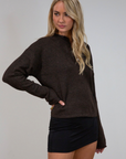 Fuzzy heather crochet knit sweater. Henley quarter neckline with button down closures. Long sleeves. Unlined. brown pullover. brown sweater. fall sweater. fall outfit