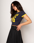 Graphic printed knit crop ringer tee. Crewneck. Short sleeves. Unlined. london graphic tee. baby crop tee