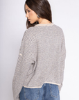 Pin striped knit cardigan
Long sleeve
Rolled collar
Button down closure
Unlined
beige striped cardigan
spring cardigan