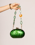 green Hardshell marble clutch
Magnetic closure
Acrylic chain straps with heart detail
Removable long and short chain
Synthetic