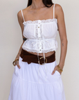white Button down tank top
Lace trim
Adjustable front tie
Sleeveless
Straight neckline
Adjustable straps
summer tank top
country side tank top