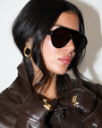 Sleek, modern aviator silhouette sunglasses
Polished black frame and warm brown lenses.
Designed for a lightweight, comfortable fit with full UV protection.
A clean everyday shape that works with any look — hot without trying